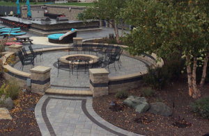 Outdoor circular patio seating area around a firepit